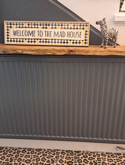 Customer photo — Welcome to The Mad House Panoramic Print