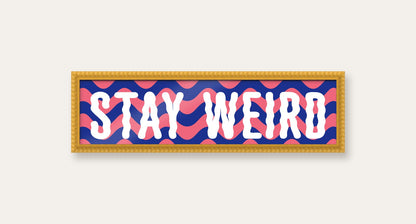 Stay Weird panoramic print in a yellow bobbin frame