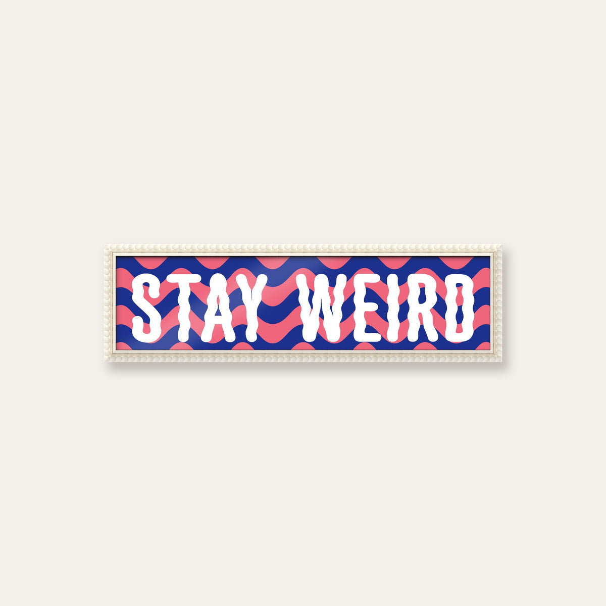 Stay Weird panoramic print in a white bobbin frame