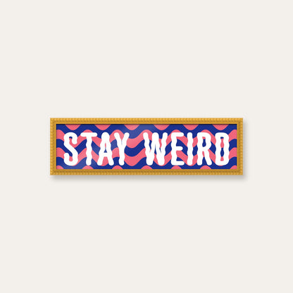 Stay Weird panoramic print in a yellow bobbin frame