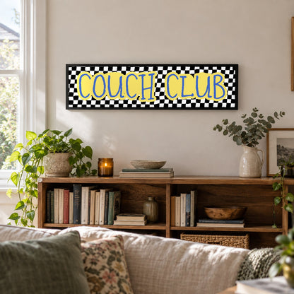 Couch Club panoramic print in a black frame in a room setting