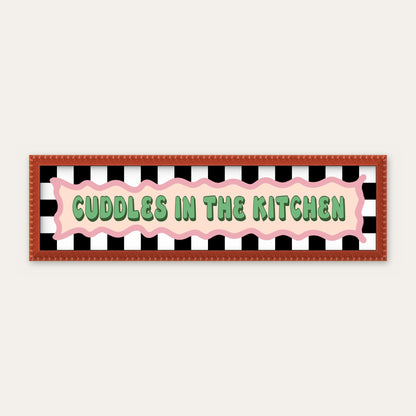 Cuddles In The Kitchen panoramic print in a red bobbin frame