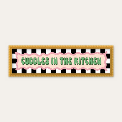 Cuddles In The Kitchen panoramic print in a yellow bobbin frame
