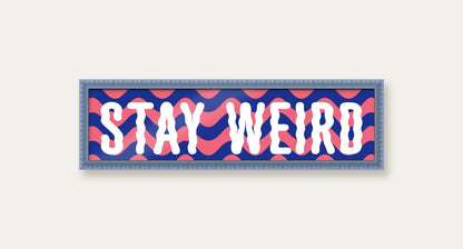 Stay Weird panoramic print in a sky blue bobbin frame