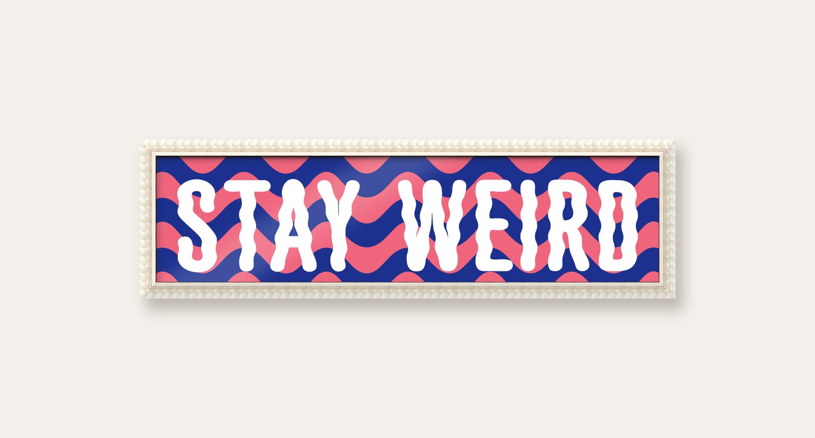 Stay Weird panoramic print in a white bobbin frame