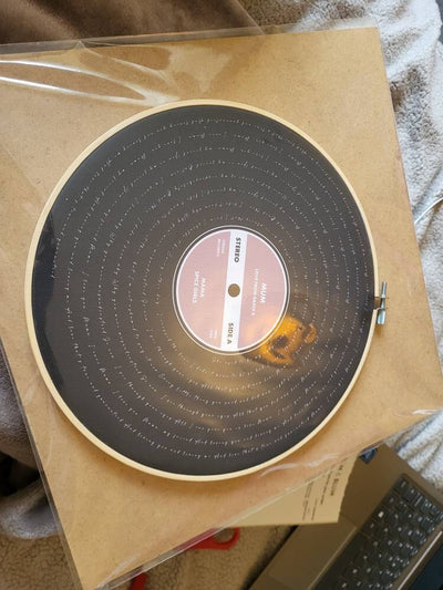 Customer photo — Personalised Song Lyrics Vinyl Record Cotton Canvas Circular Frame