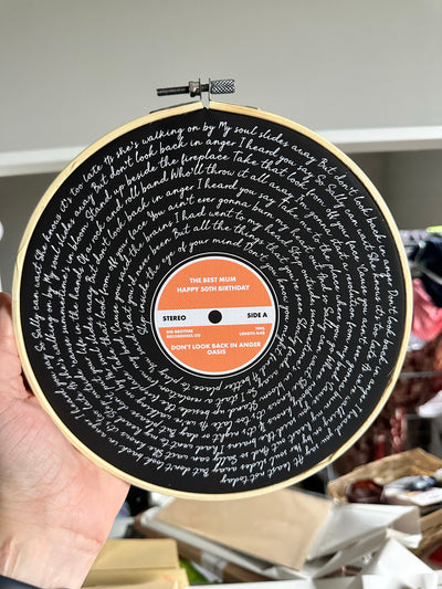 Customer photo — Personalised Song Lyrics Vinyl Record Cotton Canvas Circular Frame